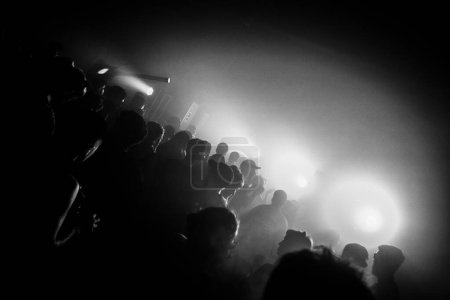 Photo for Backlit view of crowded party - Royalty Free Image