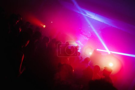 Photo for Backlit view of crowded party - Royalty Free Image