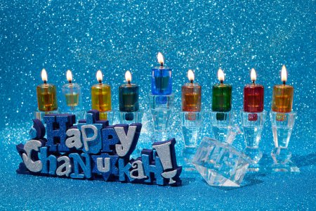 Jewish holiday Hanukkah background with menorah and dreidel with letters Gimel and Nun-stock-photo