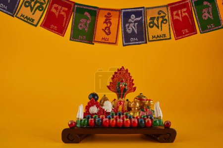 Foto de Happy Losar, Tibetan New Year background. Text on flags Om mani padme hum meaning The jewel is in the lotus. - Imagen libre de derechos