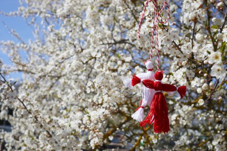 Photo for Bulgarian traditional spring decor martenitsa on the blossom tree. Baba Marta holiday - Royalty Free Image