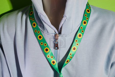 Photo for Sunflower lanyard, symbol of people with invisible or hidden disabilities - Royalty Free Image