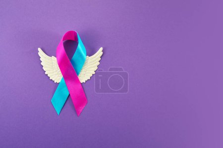 Photo for World Prematurity Day with Pink and Blue Ribbon and angel wings. - Royalty Free Image