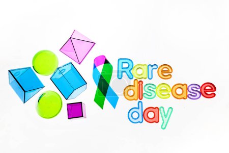 Photo for Rare Disease Day Background. Colorful awareness ribbon on white background. - Royalty Free Image