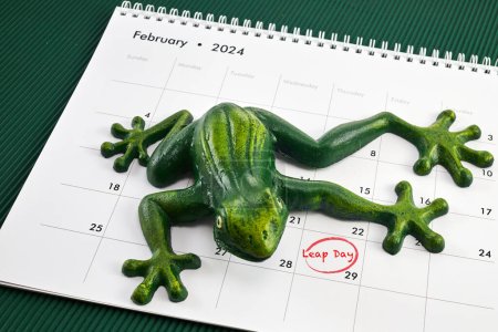 Photo for Happy Leap Day on 29 February with Jumping Frog. - Royalty Free Image