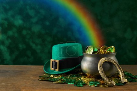 Photo for Saint Patricks Day background. Black pot full of gold coins and leprechaun hat. - Royalty Free Image