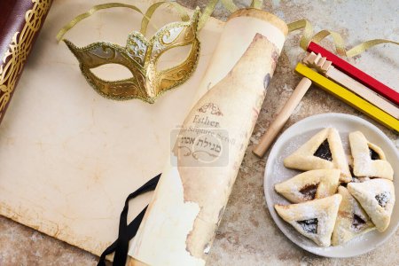 Scroll of Esther, hamans ears cookies.and Purim Festival objects.
