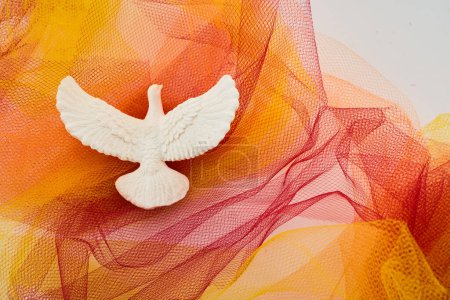 Pentecost Sunday. Pentecost background with flying dove and flame background