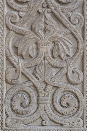 Photo for Antique carved stone bas-relief with a floral pattern. Background - Royalty Free Image