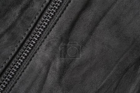 Téléchargez les photos : Fond horizontal texturé en daim noir froissé avec fermeture éclair en métal noir - en image libre de droit