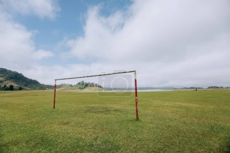 Photo for Rusty and abandoned soccer goal in a field of Tenango de Las Flores - Royalty Free Image