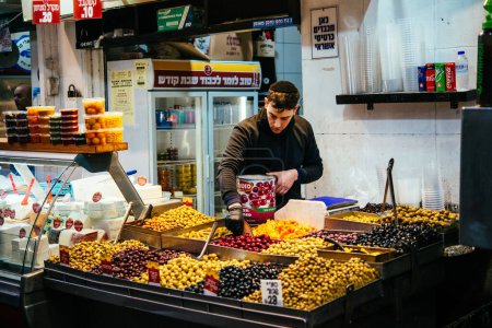 Photo for JERUSALEM, ISRAEL - 14 JANUARY, 2020: Olives on sale at Mahane Yehuda market in Jerusalem, Israel. - Royalty Free Image