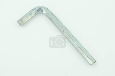 Photo for Hex Key Silver Isolated. Silver coloured hex key. White background. - Royalty Free Image