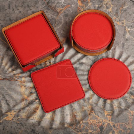 Photo for Leather table mats in different colors. Concept shot, top view. Custom background view of leather table coaster. Stitched and leather table coaster. Beverage coaster. - Royalty Free Image