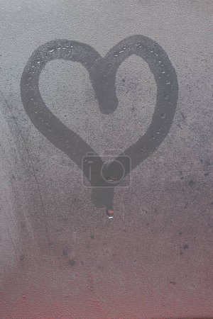 Photo for Painted heart on the foggy window. I love you on Valentine's Day. - Royalty Free Image
