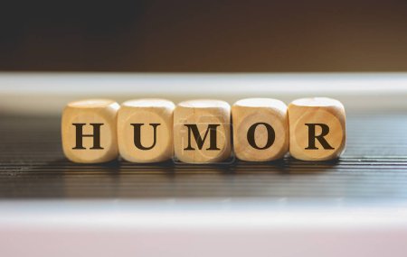 Photo for The word HUMOR written on wooden cubes. Studio photo. - Royalty Free Image