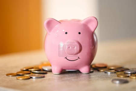 Photo for Close-up view of piggy bank with coins, finance and economy concept - Royalty Free Image