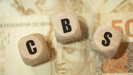 acronym CBS for Contribution on Goods and Services in Brazilian Portuguese written on wooden dice 