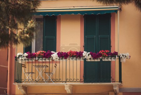 Traditional Italian balcony. Streets and buildings of the ancient city of Italy.