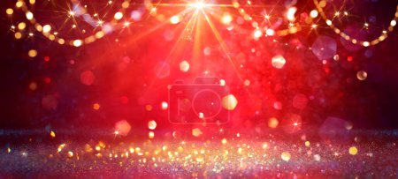 Foto de Shiny Red Glitter With Bright Star Light In Abstract Defocused Christmas Background - Imagen libre de derechos