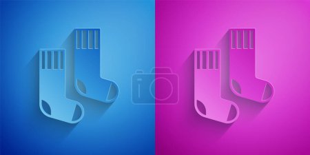 Illustration for Paper cut Socks icon isolated on blue and purple background. Paper art style. Vector - Royalty Free Image