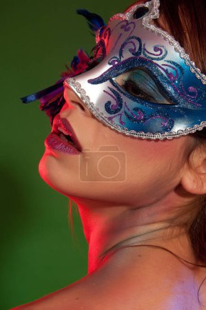 Photo for Sensual woman with colorful makeup and carnival masks - Royalty Free Image