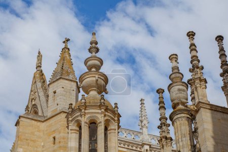 Photo for Leon Cathedral stone pinnacles, Spain. Cloudy blue sky as background - Royalty Free Image