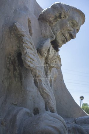 Foto de La Albuera, Spain - Jun 12th, 2021: Hans Christian Andersen monument,  representing the author writing The Ugly Duckling. Badajoz, Spain. - Imagen libre de derechos