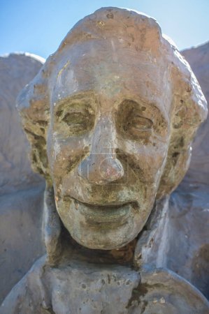 Foto de La Albuera, Spain - Jun 12th, 2021: Hans Christian Andersen monument,  representing the author writing The Ugly Duckling. Badajoz, Spain. - Imagen libre de derechos