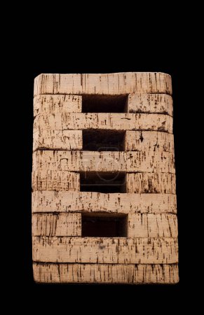 Téléchargez les photos : Stump stool made of cork also senton. Isolated over black - en image libre de droit