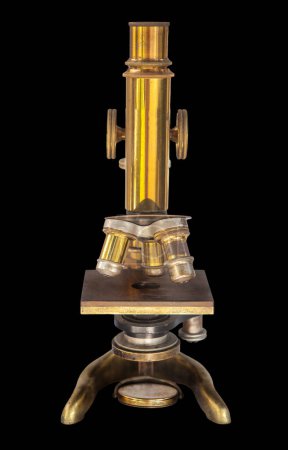 Téléchargez les photos : Microscope optique 1920. Isolé sur fond noir - en image libre de droit