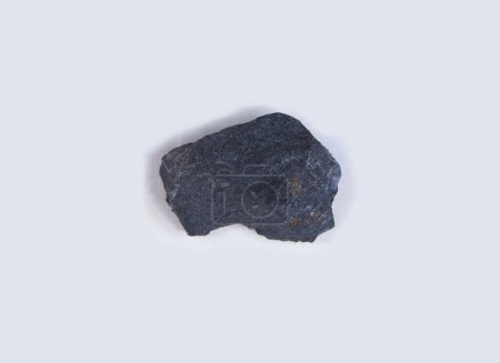 Photo for Fragment of onyx mineral. Isolated over white fabric cloth - Royalty Free Image