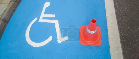 Photo for Reserved parking for vehicles of people with disabilities. Just painted floor signal - Royalty Free Image
