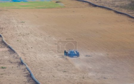 Photo for Merida, Spain - Jan 28th, 2024: Extremadura 1/8tt gas Championship RC Car. Car accelerating on a straight - Royalty Free Image