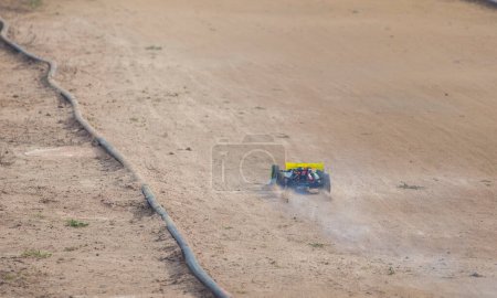 Photo for Merida, Spain - Jan 28th, 2024: Extremadura 1/8tt gas Championship RC Car. Car accelerating on a straight - Royalty Free Image