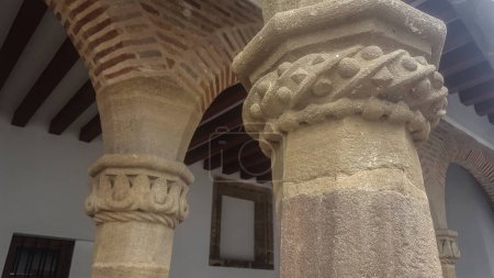 Carved granite capitals of the former Inquisition Court building, Llerena, Badajoz, Spain