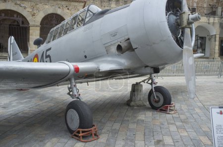 Photo for Caceres, Spain - May 27th, 2021: North American Aviation T-6 Texan. Spanish military aviation exhibition. Caceres main square, Spain - Royalty Free Image
