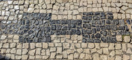 Pavé portugais morceaux plats de pierres. Monumental Complex road surfaces, Caceres, Espagne