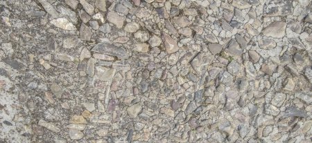 Cobblestone pavement made with quartzite undevastated stones. Monumental Complex road surfaces, Caceres, Spain