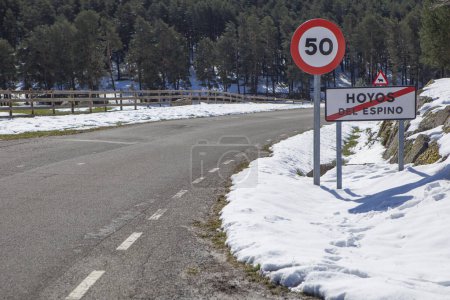 Hoyos del Espino road exit, Avila, Castile and Leon, Spain. Snowy landscape