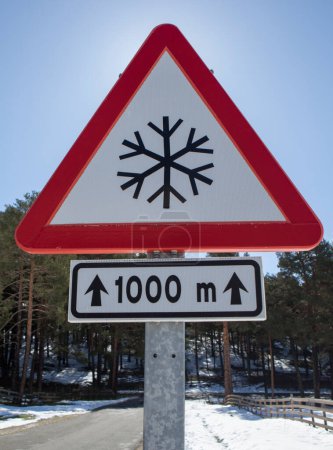 Snow road sign on a local mountain road. Closeup