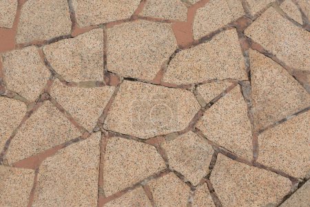 Foto de Losas de mármol irregulares dispuestas en el suelo - Imagen libre de derechos
