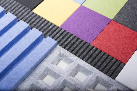 Foto de Samples of acoustic polyester products in different colors and shapes - Imagen libre de derechos