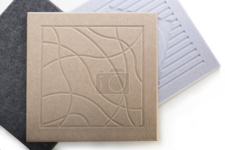 Decorative panels made of acoustic polyester in gray and beige colors
