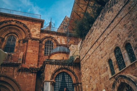 Photo for Church of the Holy Sepulcher in the Old City of Jerusalem, Israel. Typical stoned houses and walls of jewish historic quarter area part. - Royalty Free Image