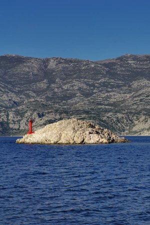Island Zigljen in front of Island of Pag in the in the Pag water area in Croatia