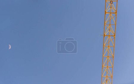 Part of a crane boom against the sky