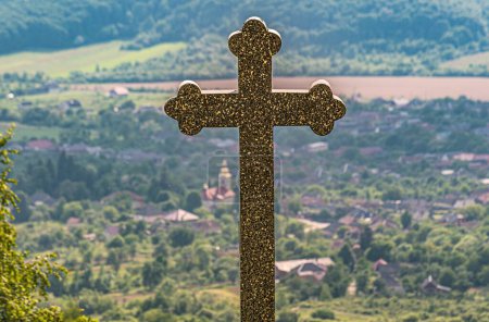 Photo for Landscape with a worship cross in a village on the mountain - Royalty Free Image