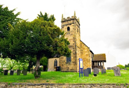 St Michael's Church, is pretty with a modest west tower complete with quoins and a Norman tympanium over its south door.