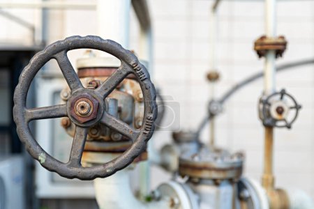 Photo for Butterfly valve is damaged by rust. Valve is used in industrial work. Water supply station inspects water pump valves equipment. Industrial pipelines and valves. - Royalty Free Image